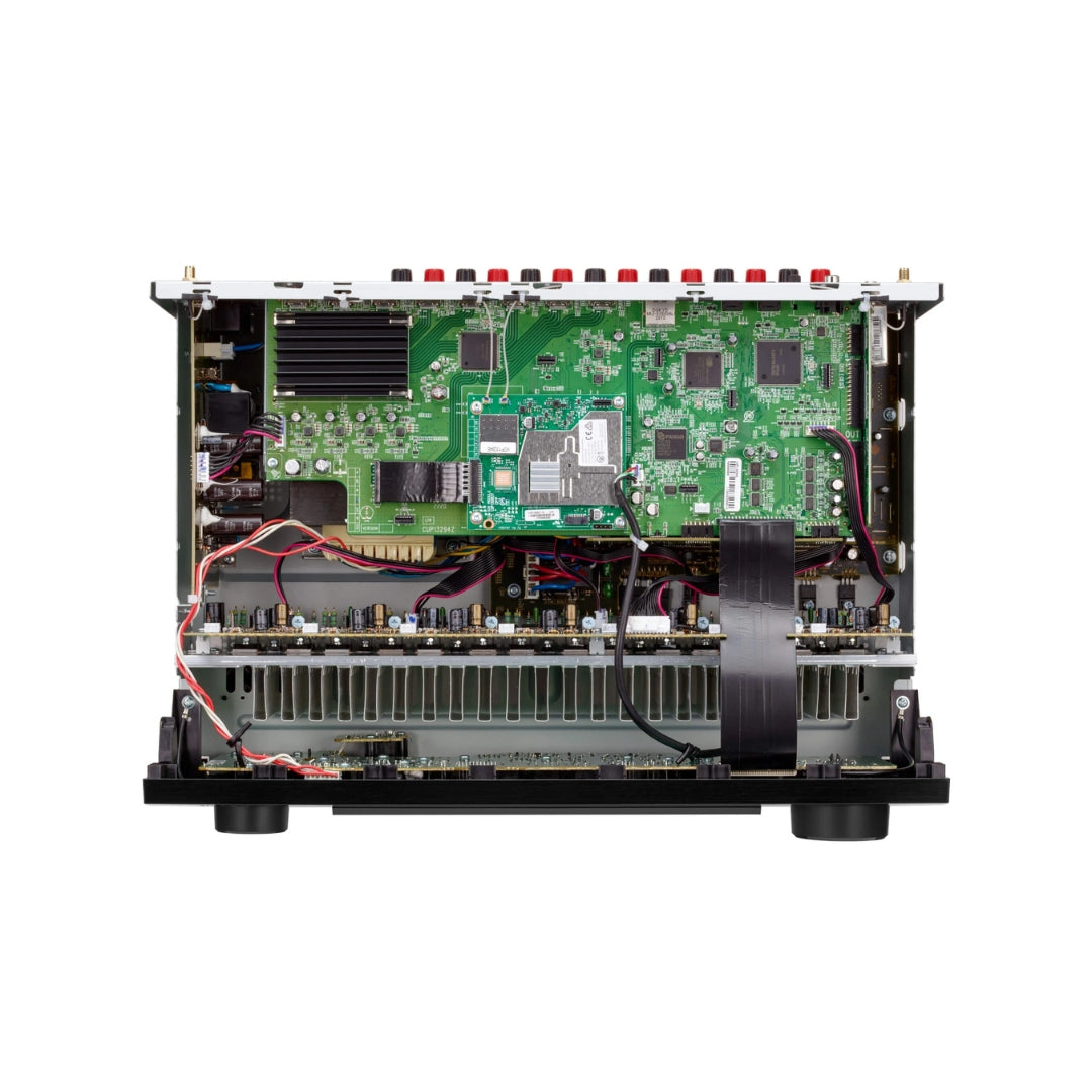 Black Denon audio receiver on a white background