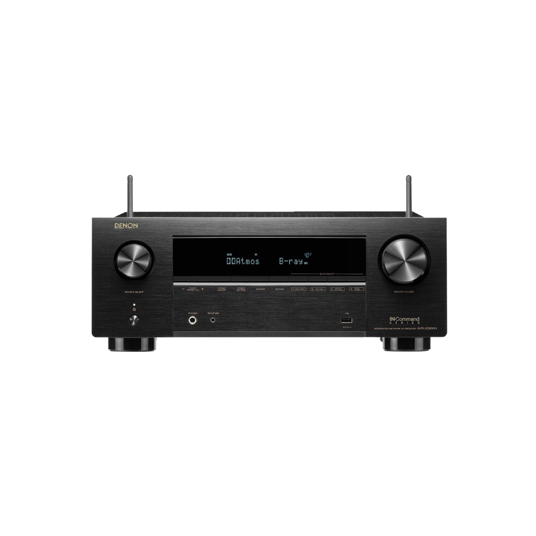 Black Denon audio receiver on a white background