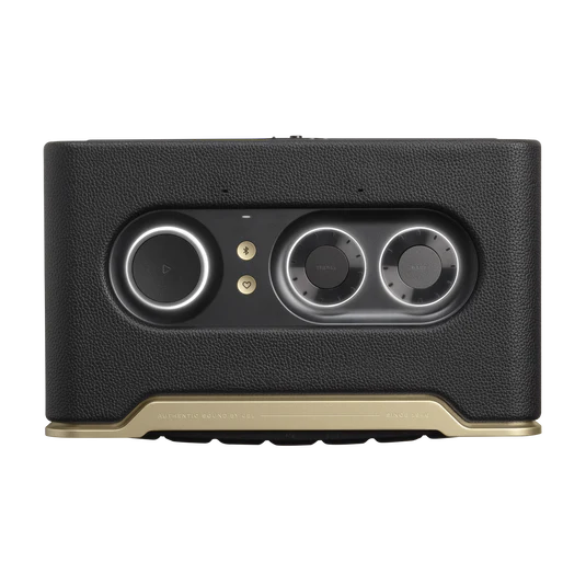 Black and gold electronic device with circular components