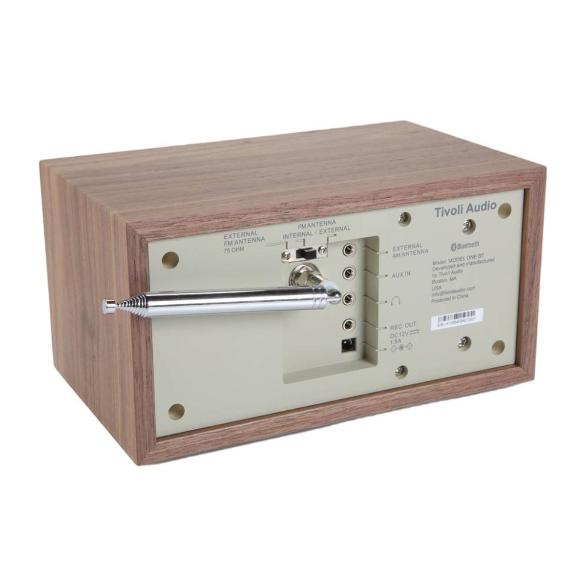 Vintage-style radio with wooden frame and beige face on a white background