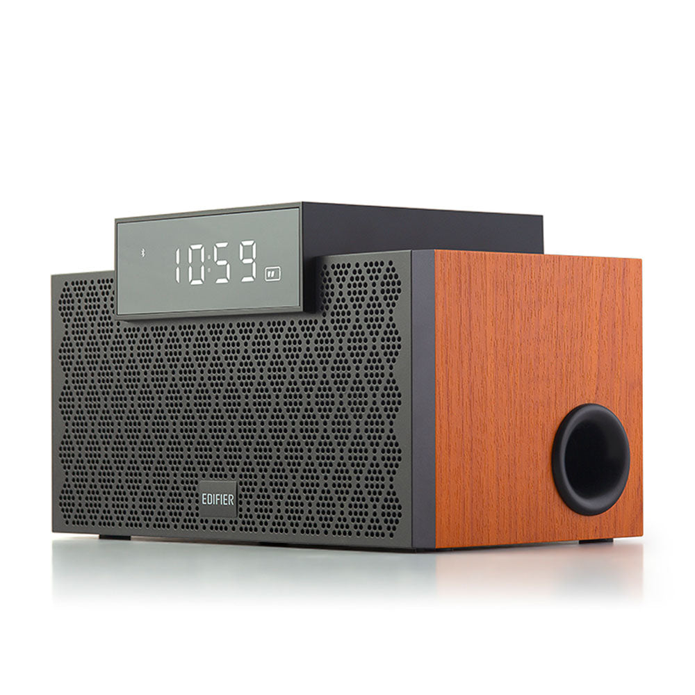 Modern clock radio with wooden front panel on a white background