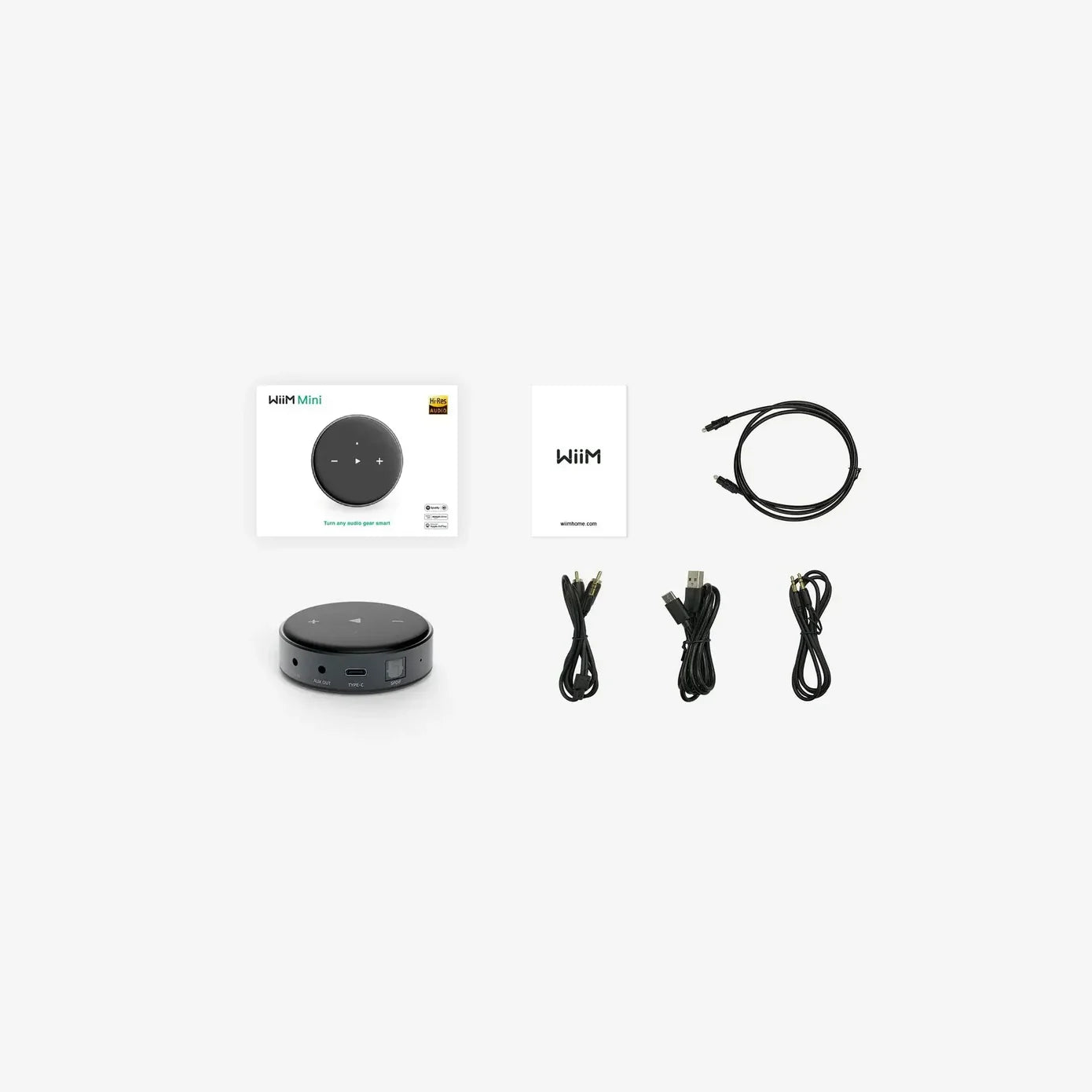Electronic device with cables and packaging on a white background